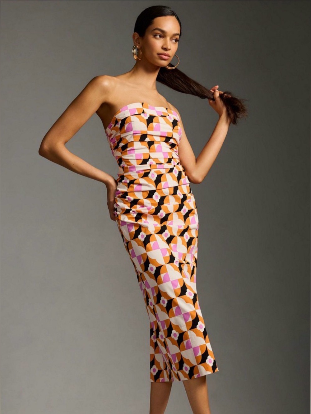 Anthropologie Slim Strapless Geometric Midi Dress in Pink and Orange.